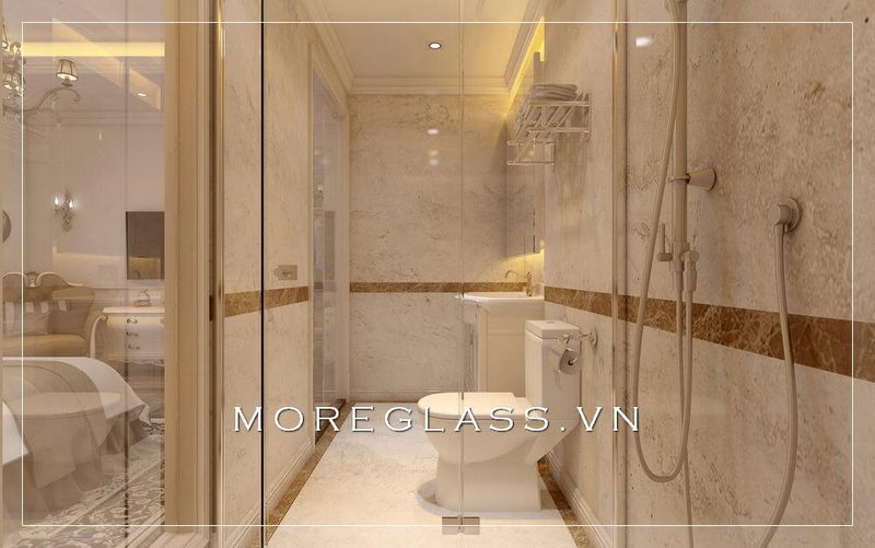 Mẫu thiết kế nhà tắm kính cường lực cao cấp, nhỏ gọn với gam màu vàng ấm tạo cảm giác gần gũi, sang trọng cho căn phòng.